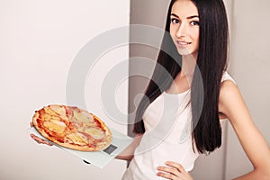 Diet And Fast Food Concept. Overweight Woman Standing On Weighing Scale Holding Pizza. Unhealthy Junk Food. Dieting, Lifestyle. We