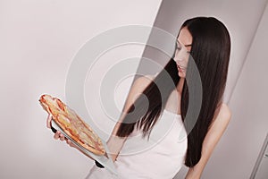 Diet And Fast Food Concept. Woman Holding Pizza. Unhealthy Junk