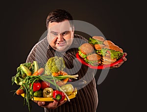 Diet fat man makes choice between healthy and unhealthy food.