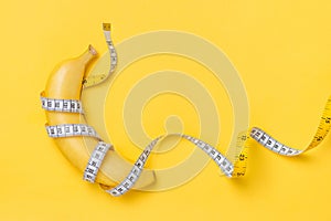 Diet, fitness and health concept presented by yellow banana wrap