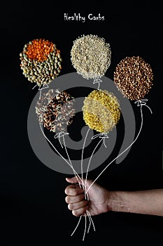 Diet food background concept, healthy carbohydrates carbs products. Different cereals and garnish - best sources of Carbs