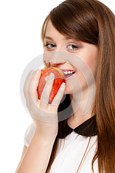 Diet. Girl eating biting apple seasonal fruit.