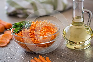 Diet and healthy salad grated carrot and oil