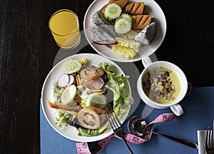 Diet meal of breakfast and Vegetables salad in  plate with meauring tape and  a Healthy food of salad .Healthy