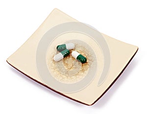 Diet pills on plate