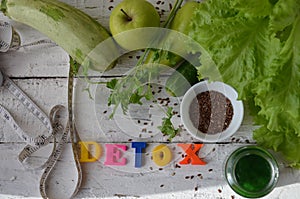 Diet plan, menu or program, tape measure, water and diet food, weight loss and detox concept, top view, green vegetables