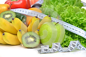 Diet weight loss breakfast concept with tape measure organic green apple salad