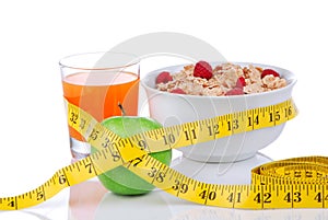 Diet weight loss concept with tape measure apple
