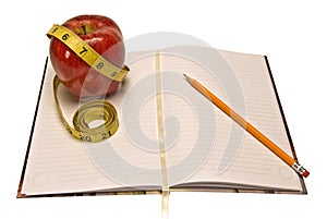 Diet Or Weight Loss Journal With Apple And Measuring Tape