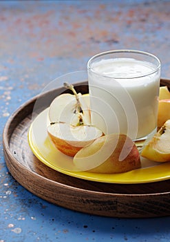 Dietary breakfast with dairy drink and apple