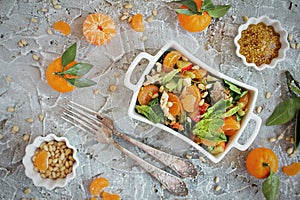 Dietary spinach salad and Mandarin oranges with dressing of mustard and pine nuts