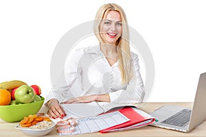 Dietician making a diet of fruits and vegetables