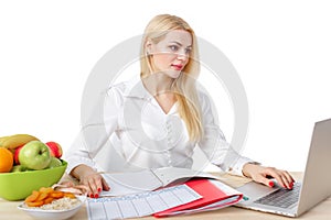 Dietician making a diet of fruits and vegetables