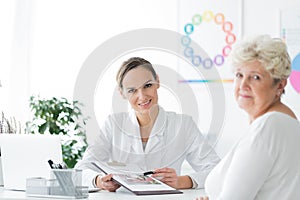 Dietician in office with patient photo