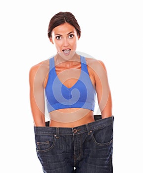 Dieting beautiful woman measuring body waist
