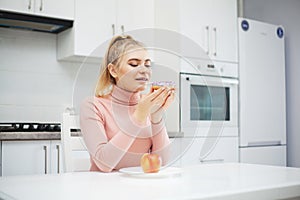 Dieting concept, beautiful young woman choosing between healthy food and junk food