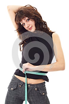 Dieting woman with measuring tape