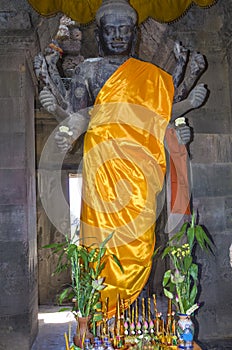 Diety Vishnu statue in Angkor Wat photo