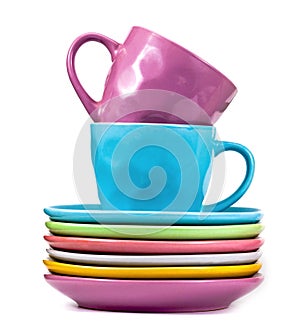 Colored tea cups and saucers