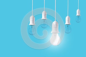 Difference light bulb on blue background. concept of new ideas