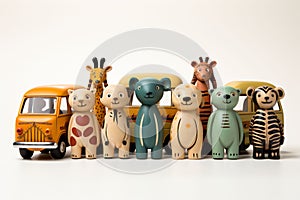 Different Africas colorful animal figures with round body and a head with ears matryoshka with yellow cars behind them