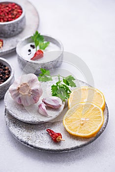 Different Asian spices in small bowls