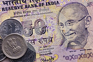 Different banknotes and coins of Indian money