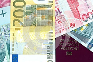 Different banknotes and EU passport photo