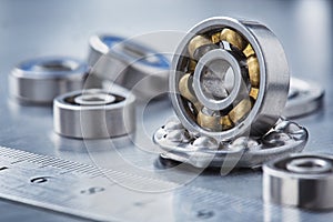 different bearings on a metal background. Part of mechanism