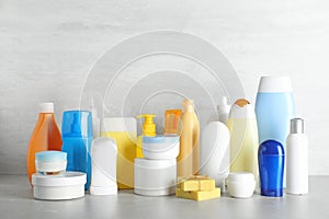 Different body care products on table