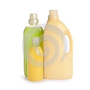 Different bottles with detergents on white background