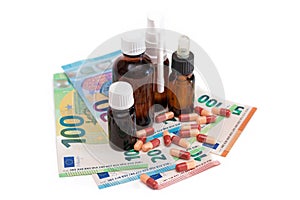 Different Bottles with Pills, Capsules and Medicines on the Euro Banknotes