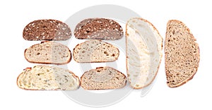 Different bread pieces on white background