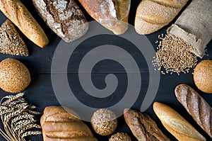Different bread products on wooden table