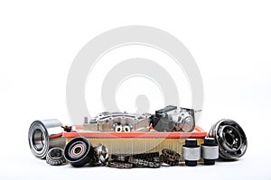 Different car spare parts on white background