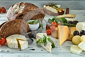 Different cheeses on table. Fresh dairy products