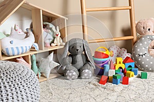 Different child toys on floor
