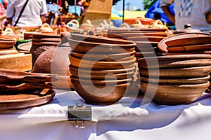 Different clay utensil for sale on a country fair