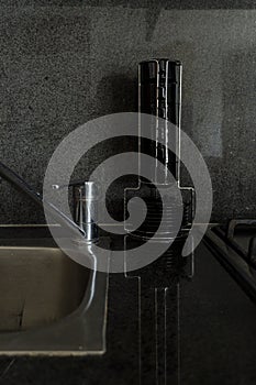 Different clean plates in dish drying rack on kitchen counter