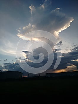 Different clouds and orange sunset