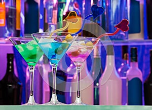 Different cocktail glasses with color drinks