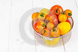 Different in color and size of tomatoes
