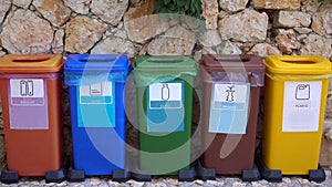 Different Colored Recycle Waste Bins for plastic, metal, paper, glass, organic