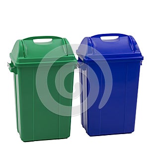 Different colored trash bins for collecting various type of garbage isolated