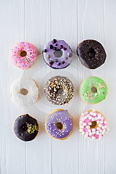 Different colorful sweet donuts