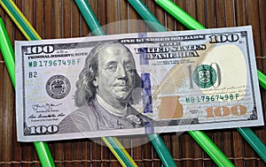 different colors on a background of 100 dollars