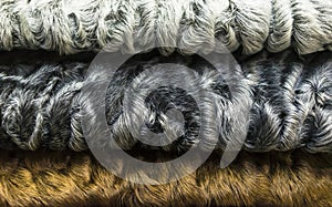 Different colors of karakul lambskin texture, background