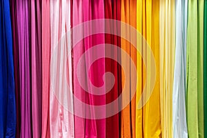 different colors of textile fabrics in an atelier or a fabric store