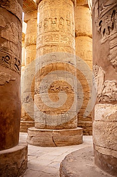 Different columns with hieroglyphs in Karnak temple. Karnak temple is the largest complex in Egypt