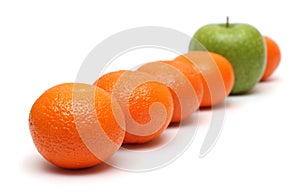 Different concepts with mandarins and apple